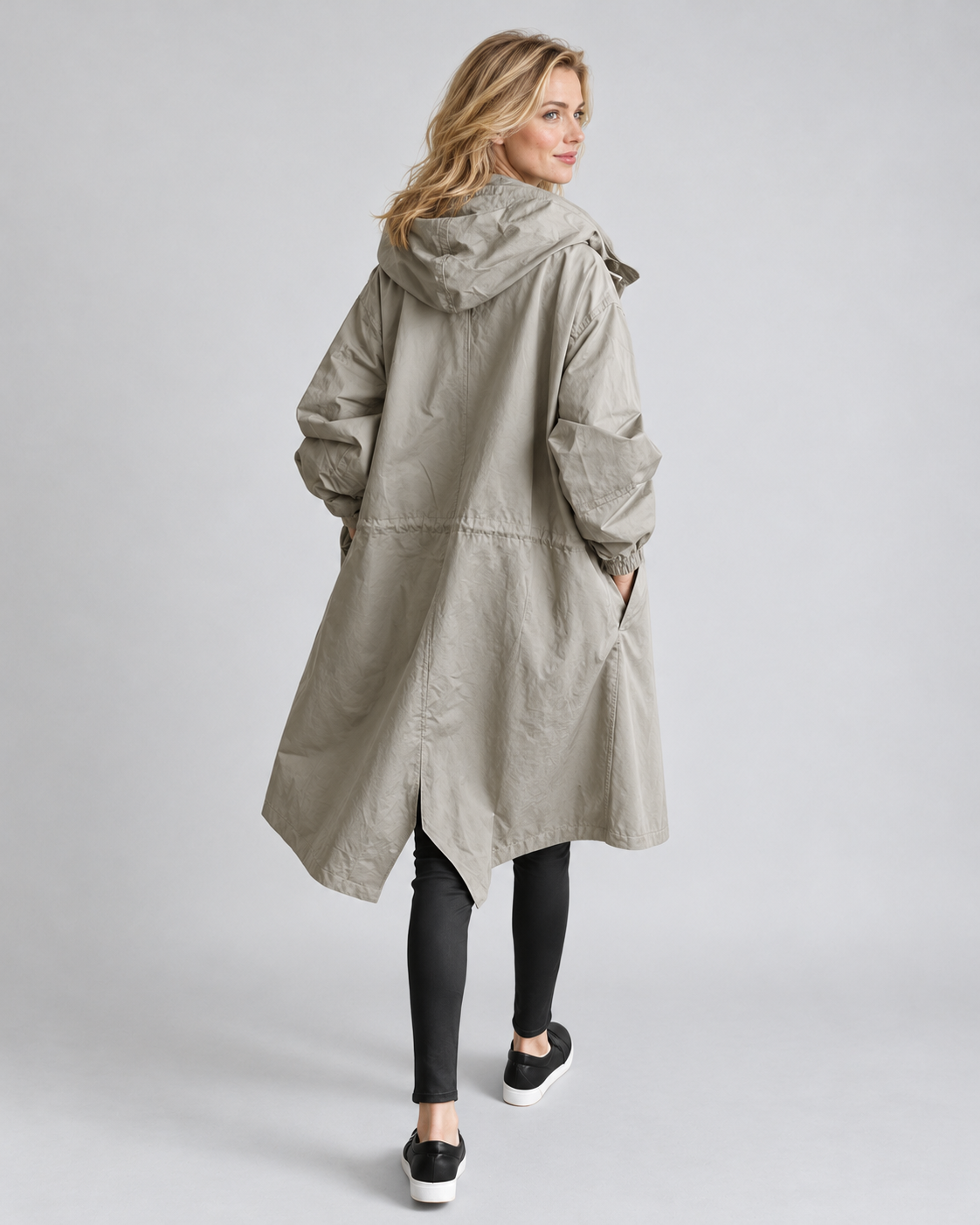 Avery & Mercer own model wearing gray rear right water-repellent hooded trench coat