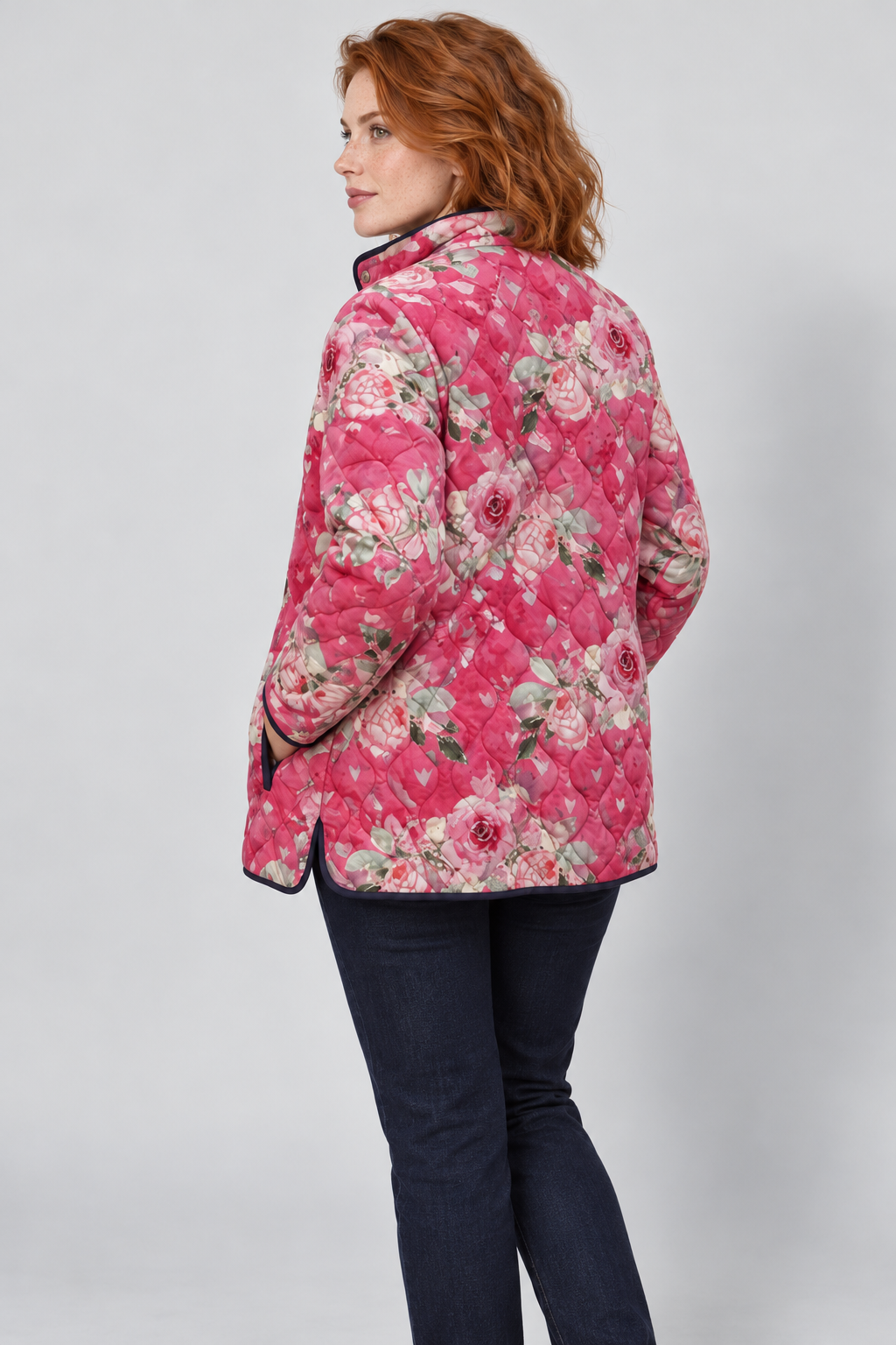Avery & Mercer own model wearing Pink Floral printed quilted jacket, rear view