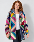 Women's oversized geometric print fleece-lined hooded cardigan, Multicolor front view on W03 with natural wall shadow