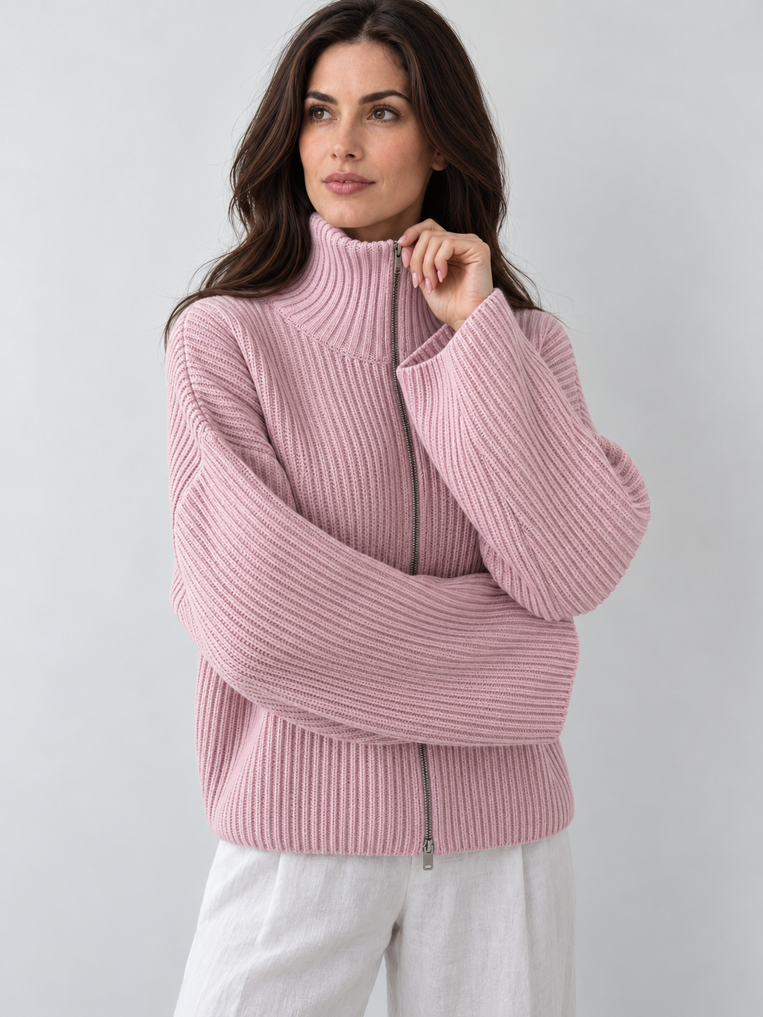 Women's pink oversized ribbed full-zip knit cardigan, detail view on Avery & Mercer model