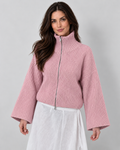 Women's pink oversized ribbed full-zip knit cardigan, hero view on Avery & Mercer model