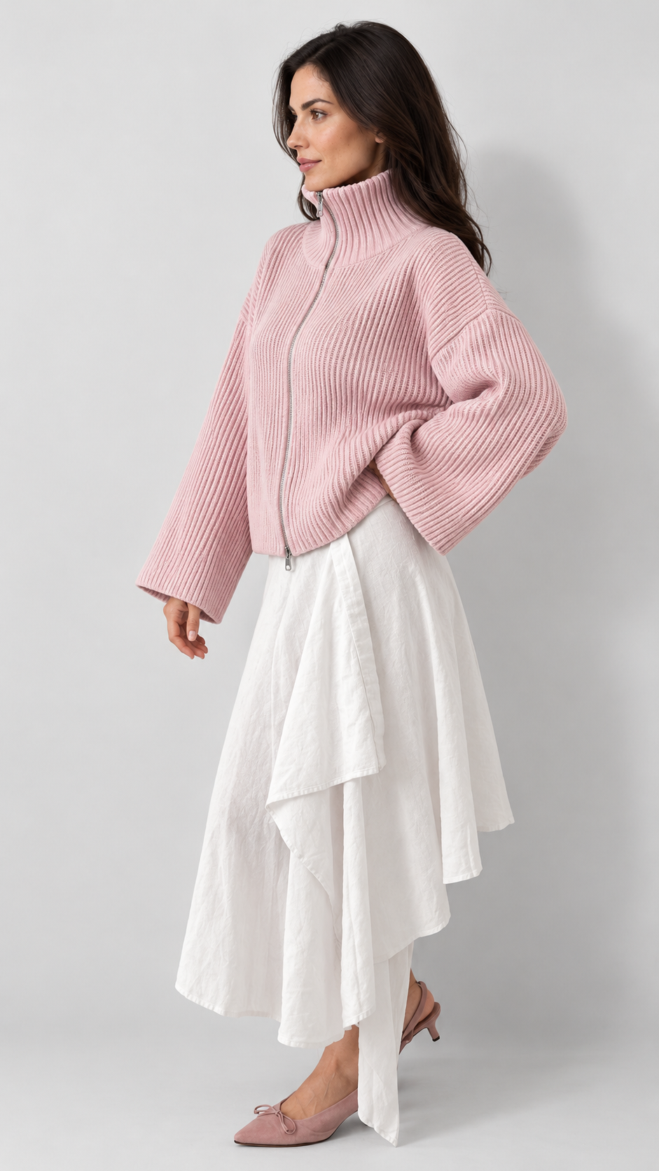 Women's pink oversized ribbed full-zip knit cardigan, side view on Avery & Mercer model