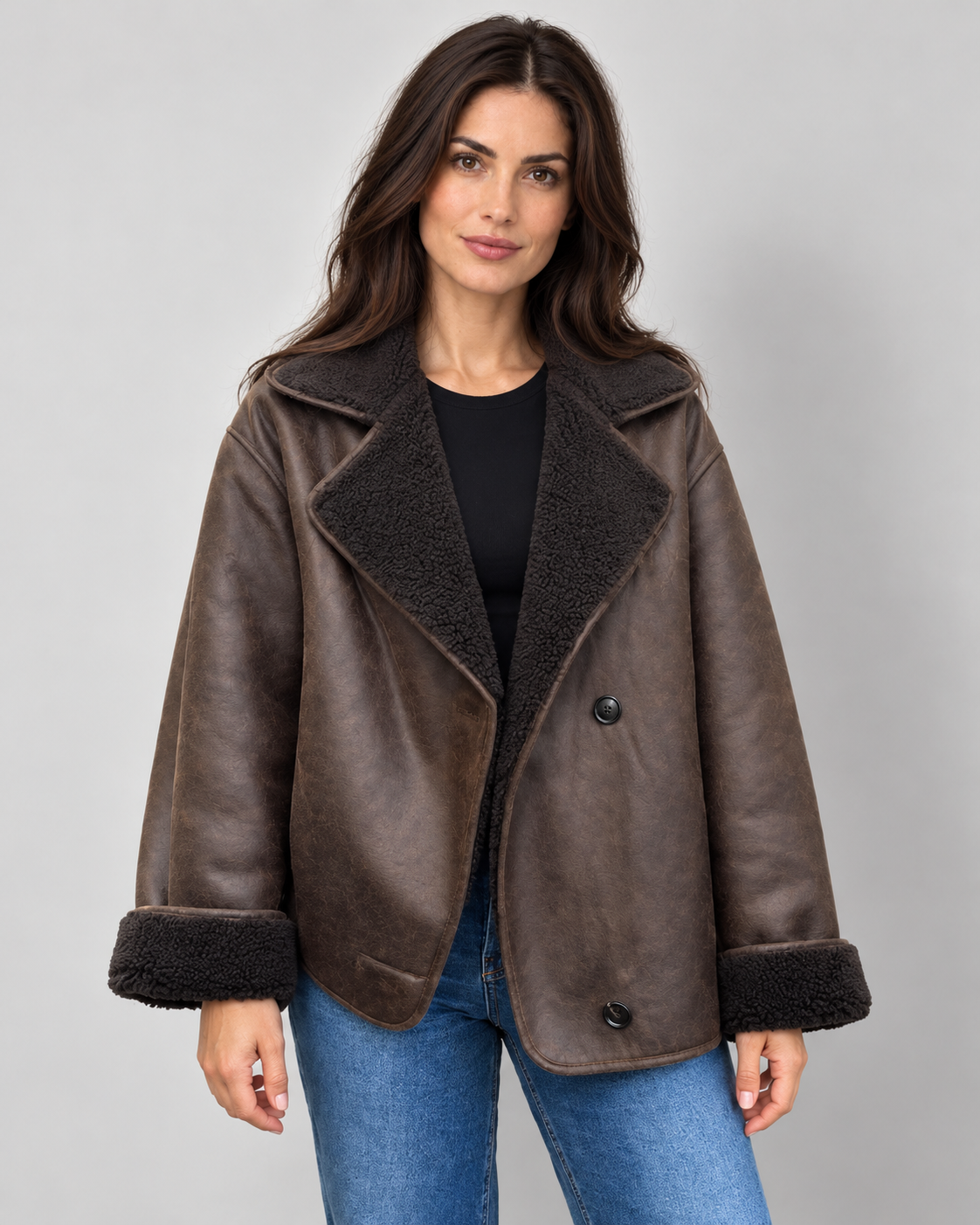 Women's brown faux leather shearling aviator jacket on Avery model, front