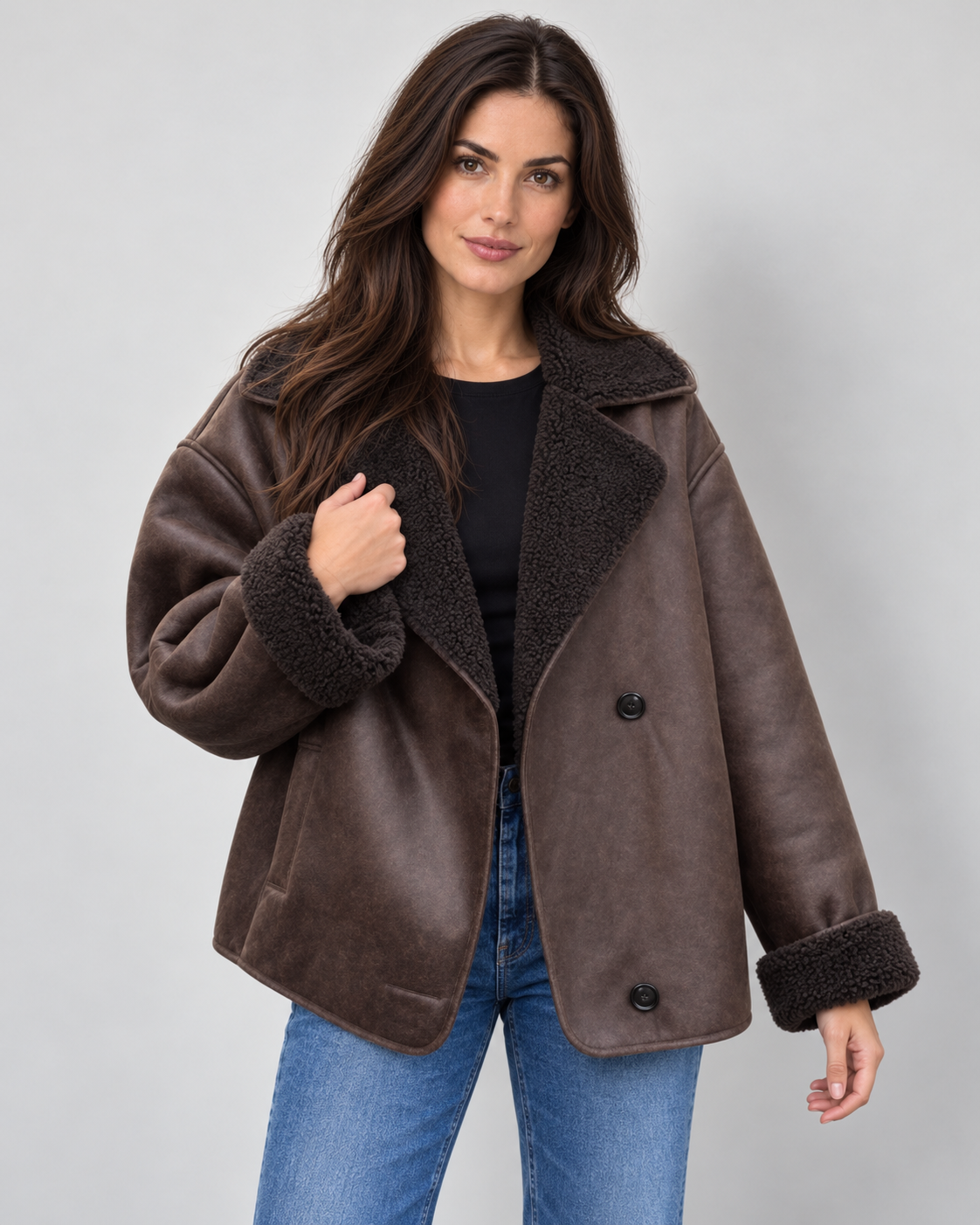 Women's brown faux leather shearling aviator jacket on Avery model, cuff-view