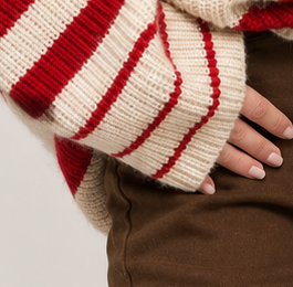 Striped turtleneck knit sweater, red cuff native crop