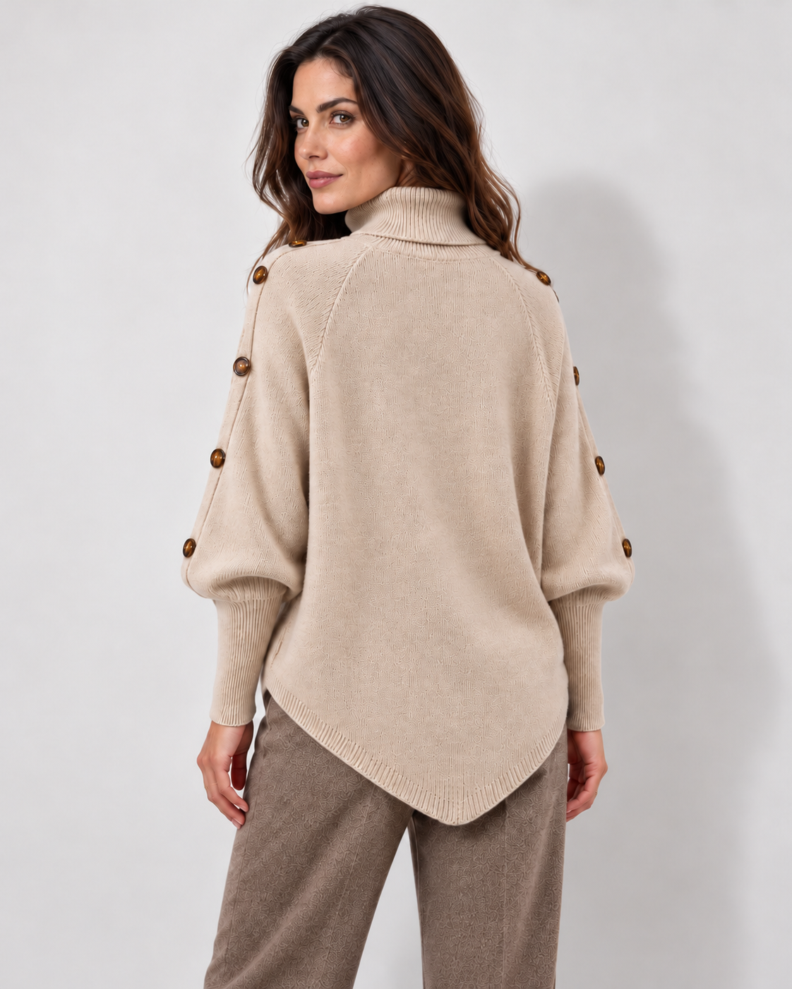 Cable-knit turtleneck sweater with shoulder buttons, beige rear