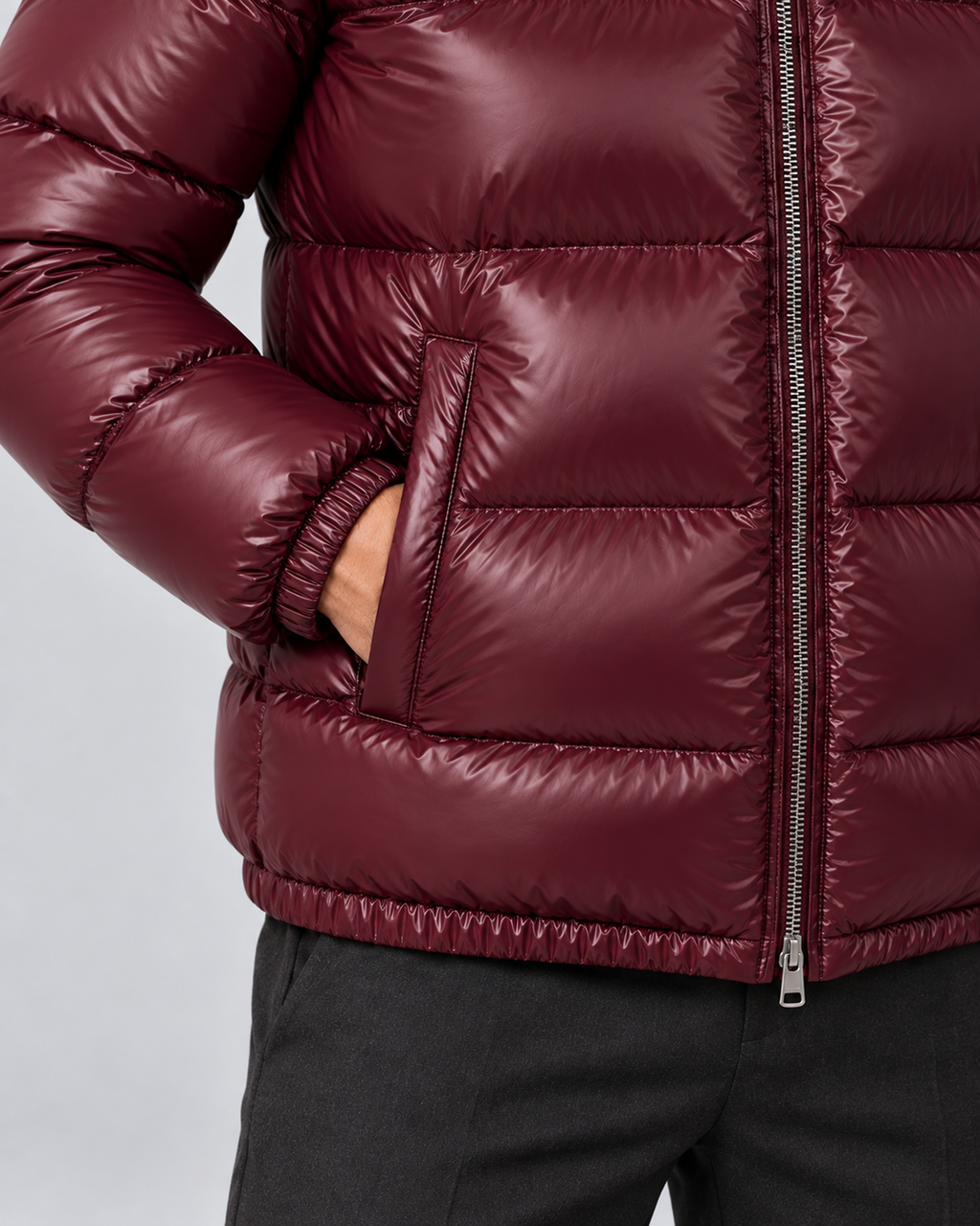 Men's hooded puffer jacket in Burgundy, pocket cuff hem detail, grey studio