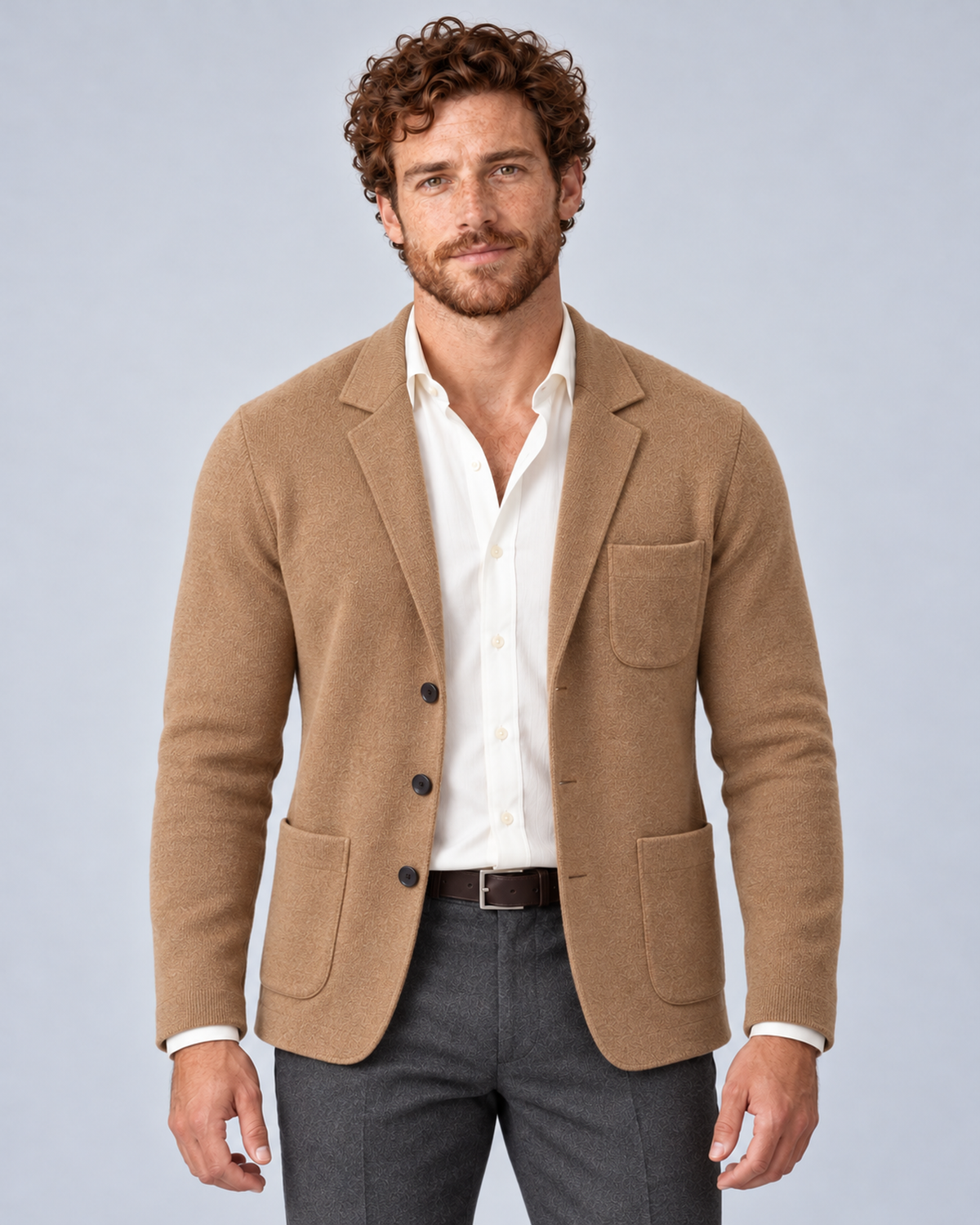 Men's knit blazer jacket in beige, front hero, photographed in a grey studio