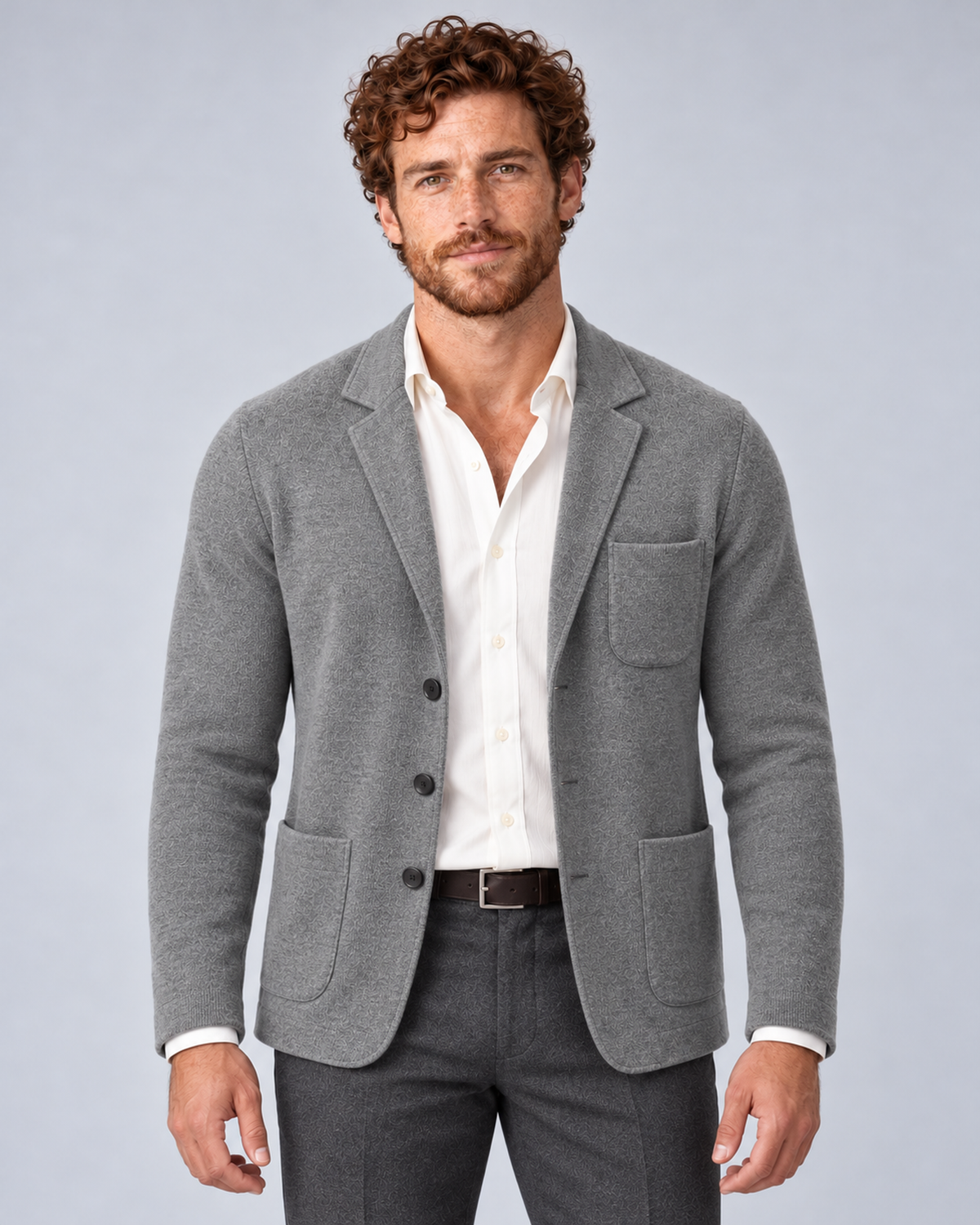 Men's knit blazer jacket in grey, front hero, photographed in a grey studio