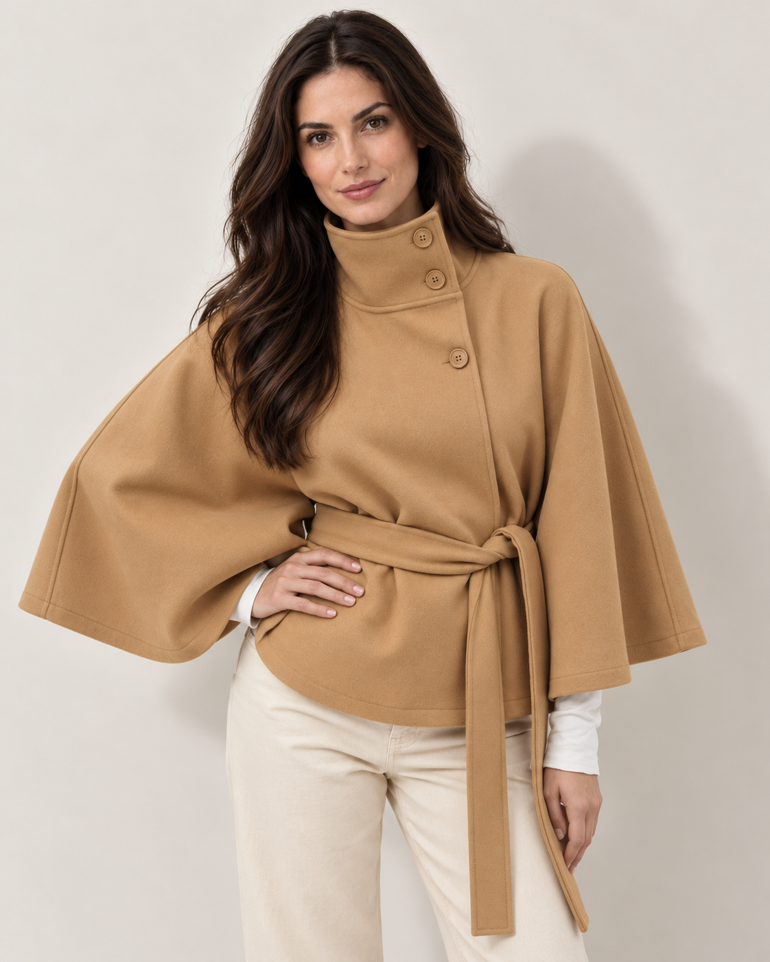 Avery & Mercer model wearing khaki belted cape jacket, front view