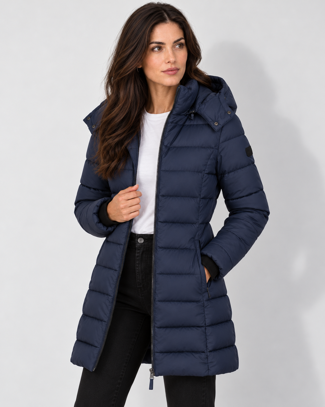 Avery & Mercer model wearing navy hooded puffer open