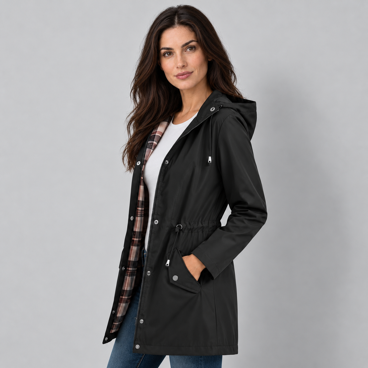 Women's Hooded Check-Lined Drawstring Raincoat in Black, side view on Avery & Mercer model