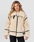Avery & Mercer model wearing the Khaki oversized teddy jacket with contrast trim, front view