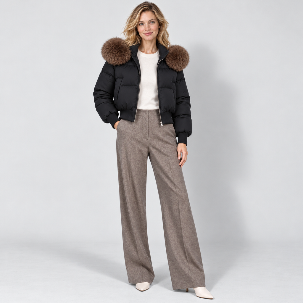Women's cropped puffer jacket in black, full view on Avery Mercer model W01
