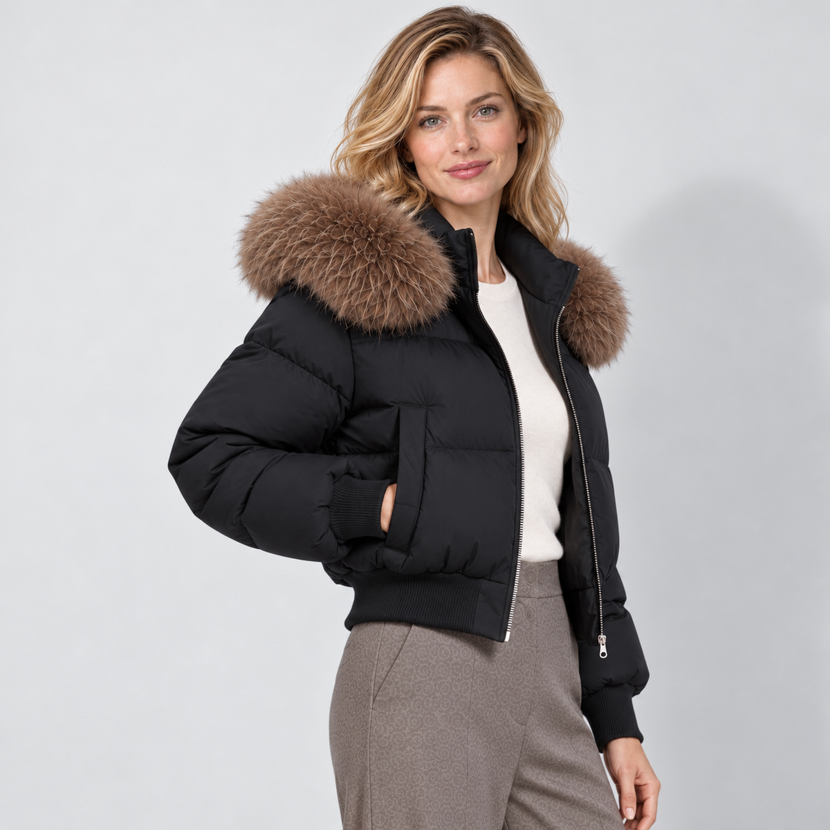 Women's cropped puffer jacket in black, open view on Avery Mercer model W01