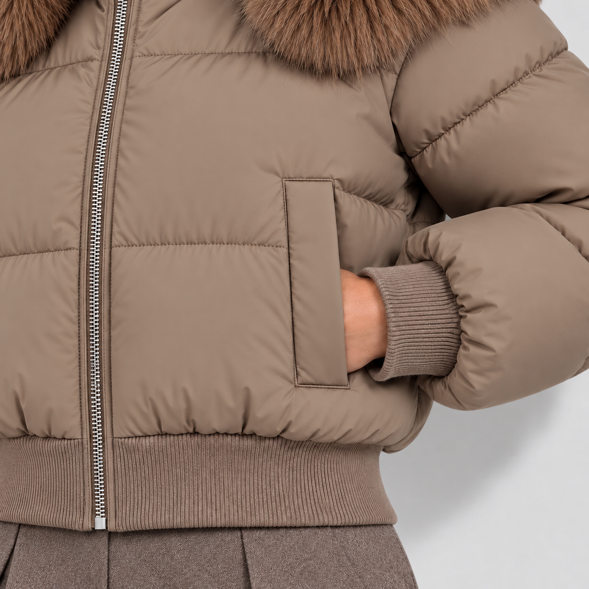 Women's cropped puffer jacket in camel, pocket view on Avery Mercer model W01