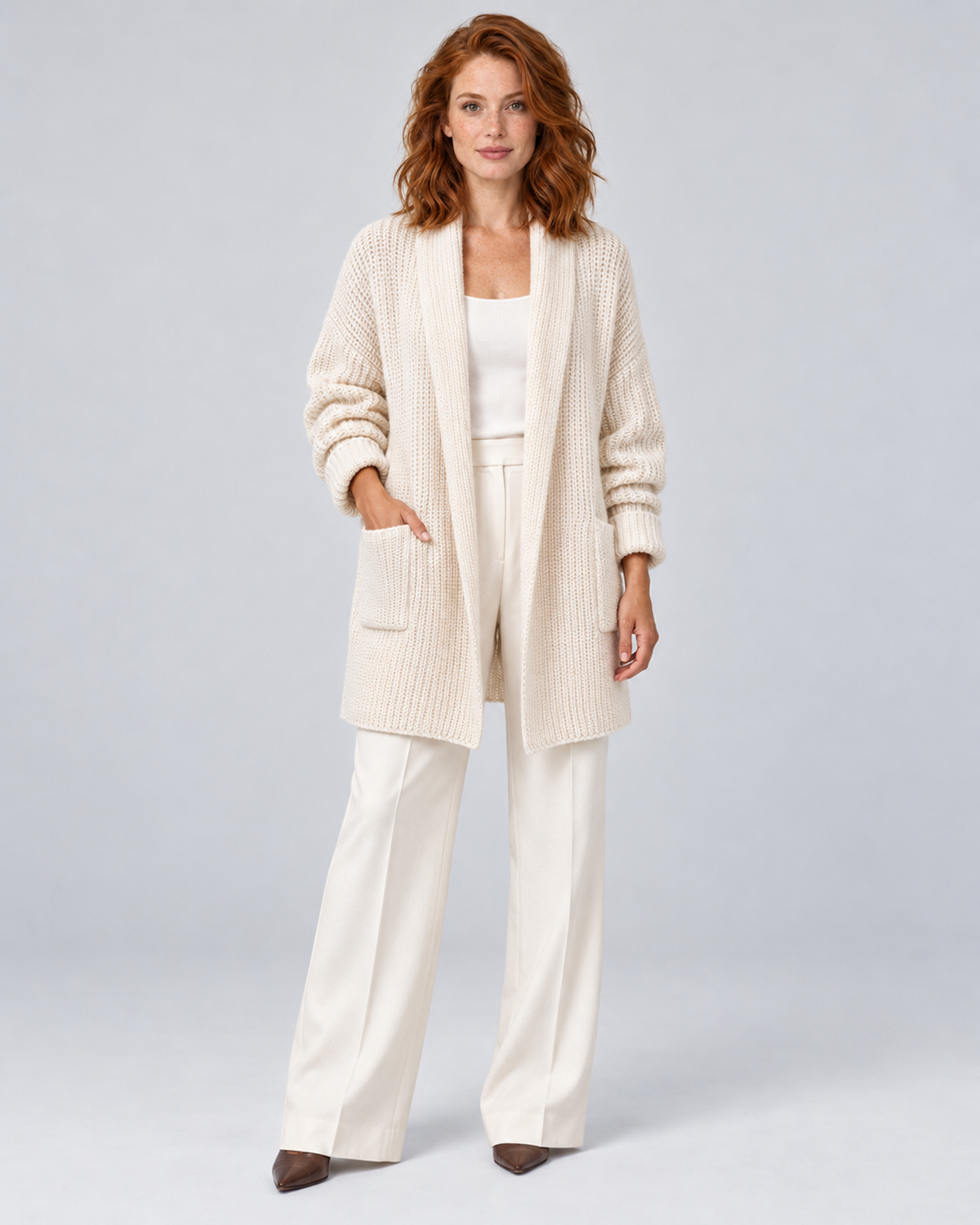 Women's longline open-front knit cardigan in beige, front hero, on approved studio model