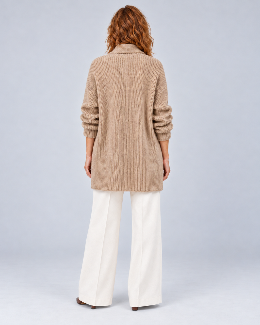 Women's longline open-front knit cardigan in brown, rear full-length, on approved studio model