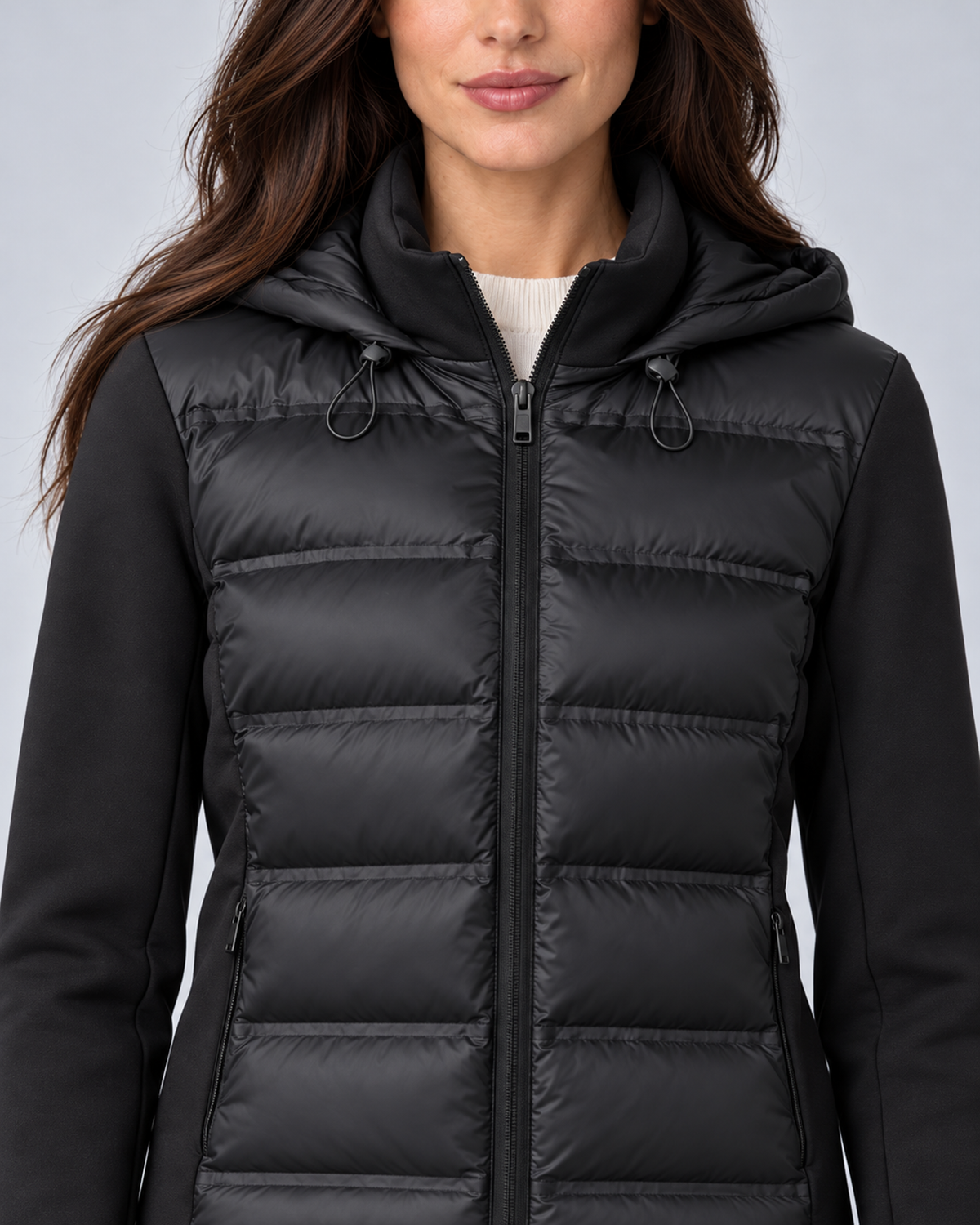 Black women's hooded puffer jacket, collar hood detail, grey studio