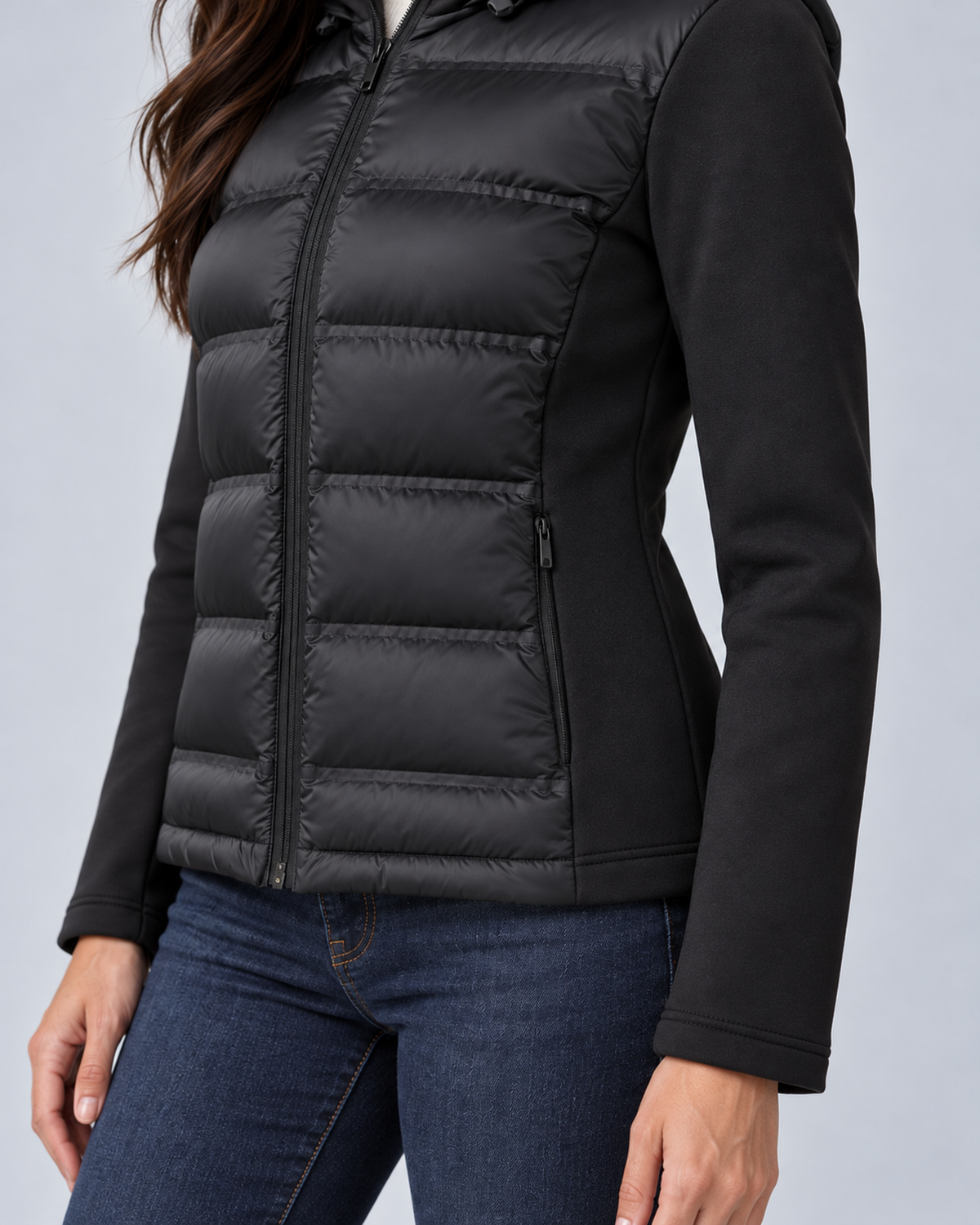 Black women's hooded puffer jacket, material pocket detail, grey studio