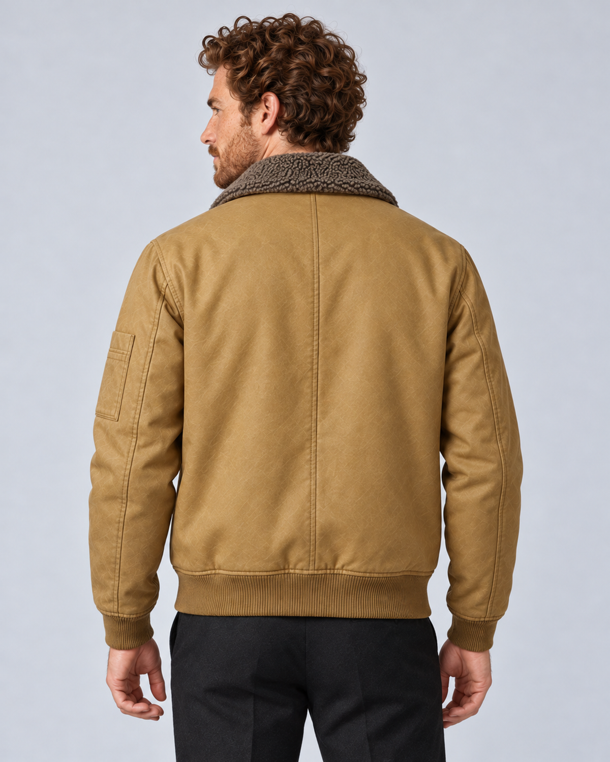 Men’s sherpa-lined zip jacket in khaki, rear view, photographed against a light grey studio background