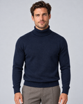Men's fine-knit turtleneck sweater in navy, front hero, on a male model in a light grey studio