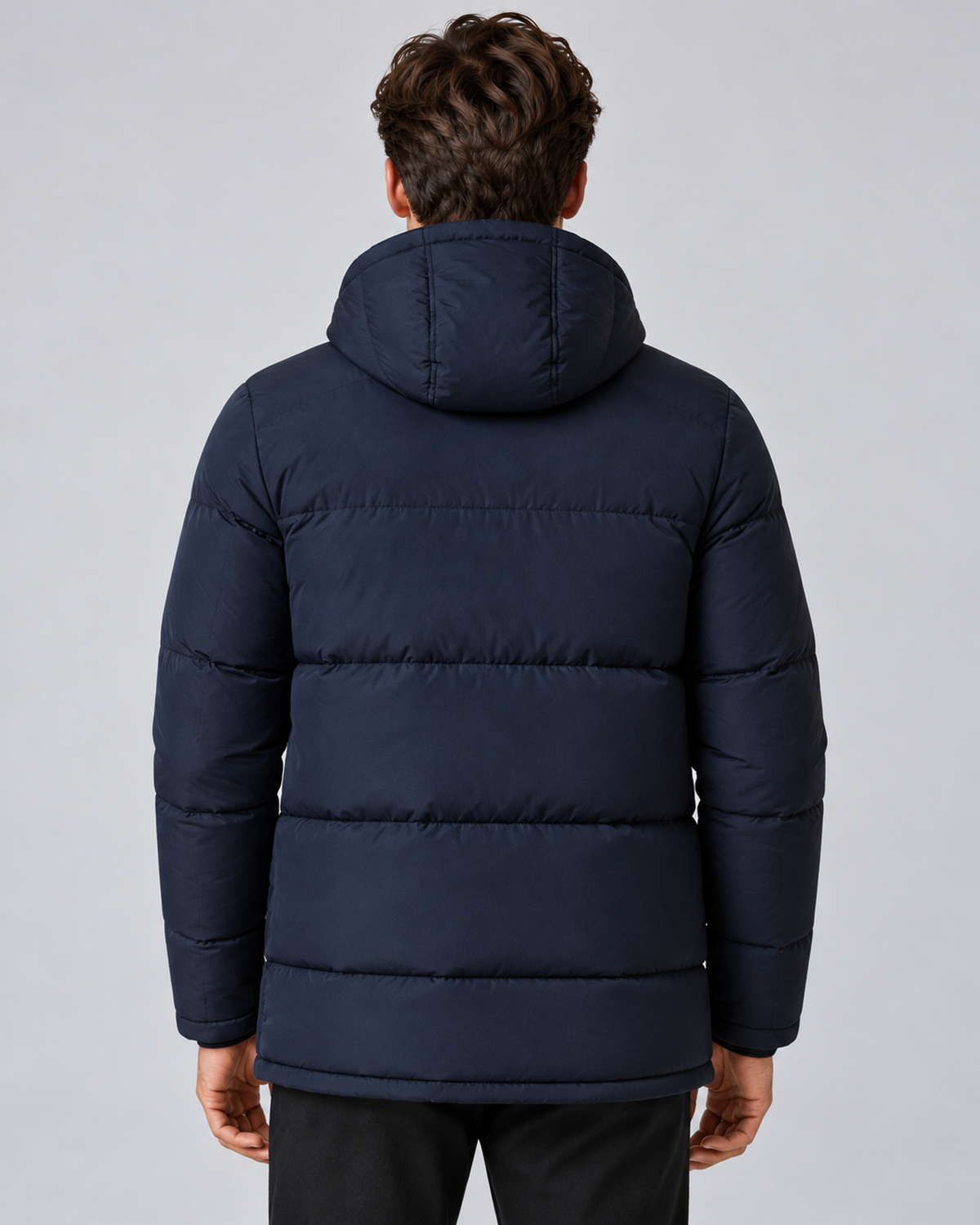 Men's hooded puffer jacket in navy, rear view, on approved studio model
