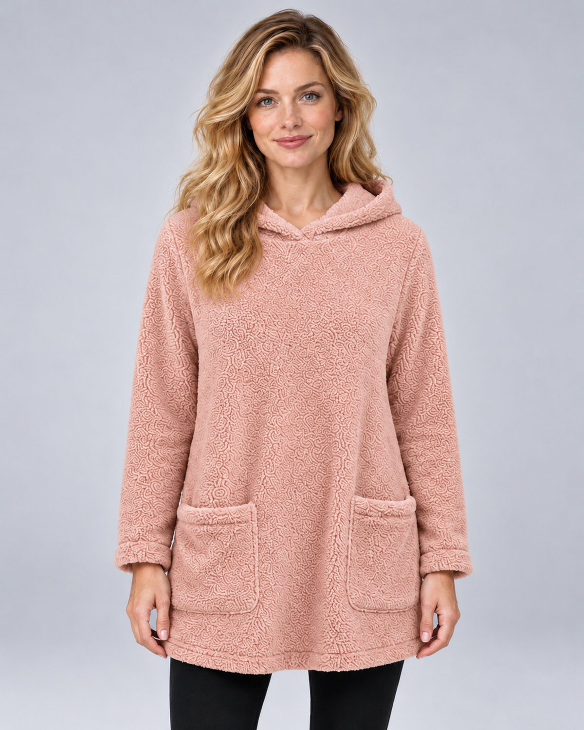 Women's plush hooded tunic in pink, front hero, photographed in a grey studio
