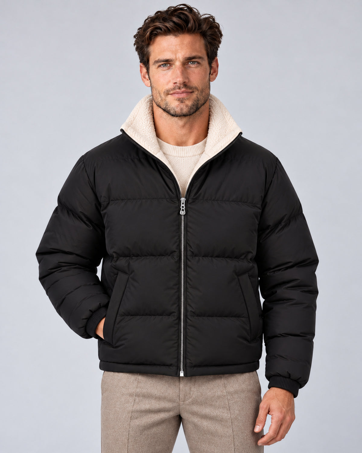 Black men's reversible puffer jacket with stand collar, front view