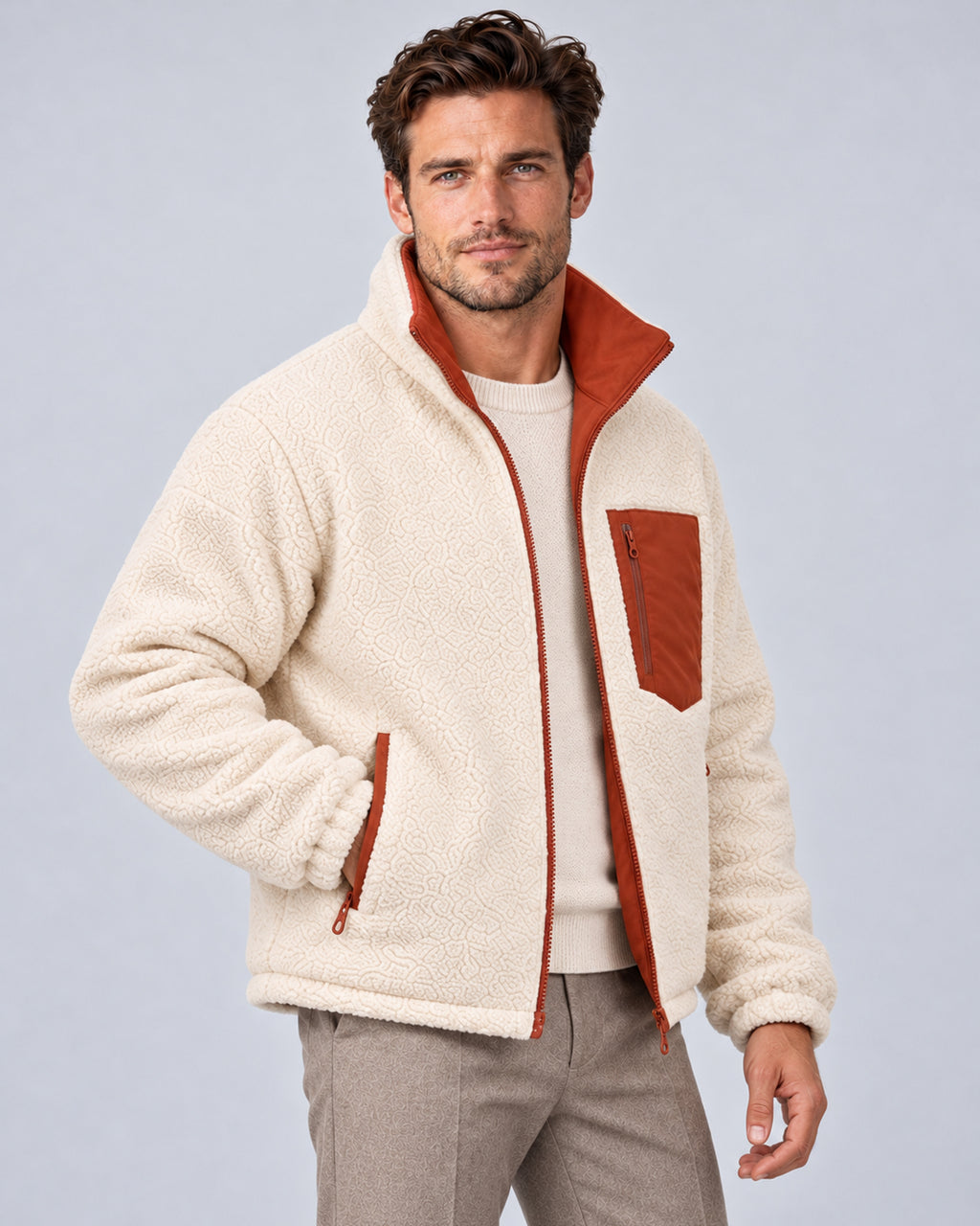 Burnt Sienna reversible jacket worn with ivory sherpa side out, front three-quarter view