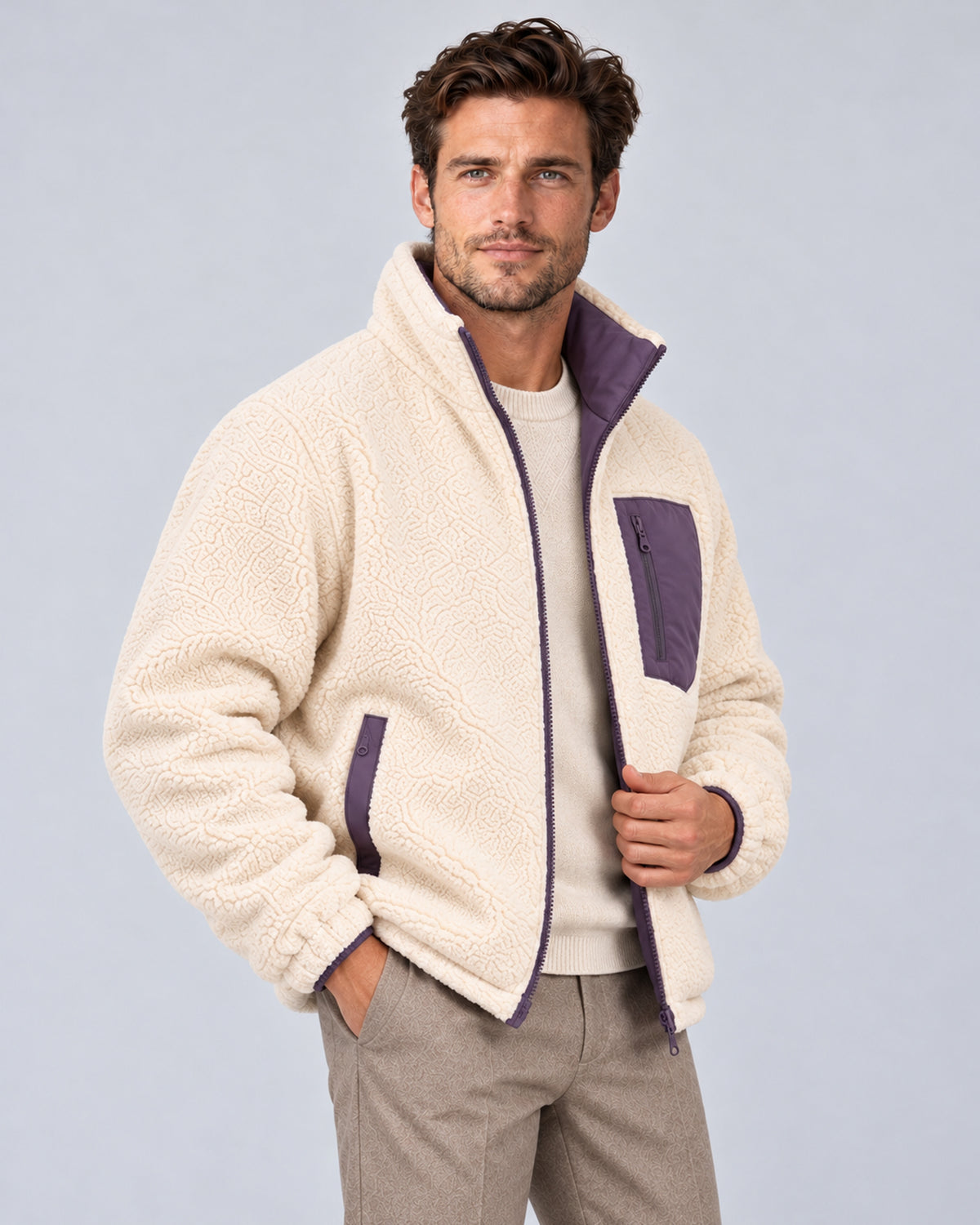 Purple reversible jacket worn with ivory sherpa side out, front three-quarter view