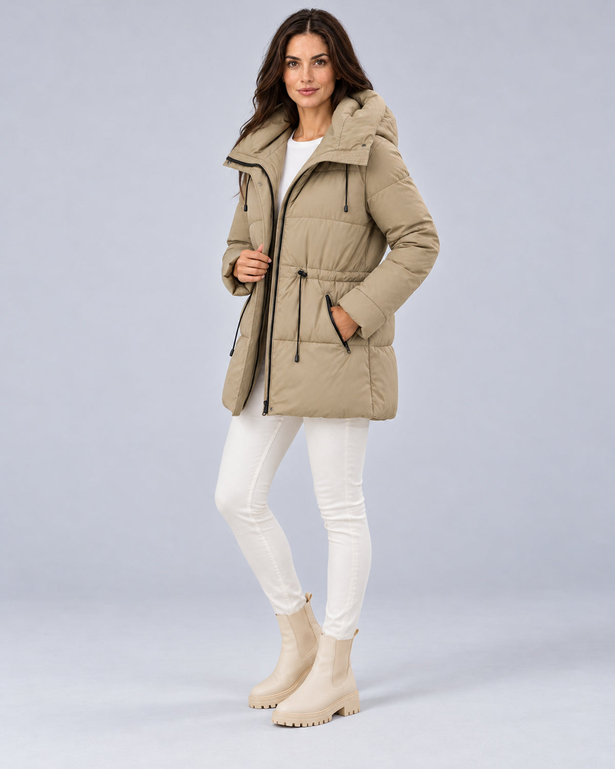 Women’s khaki padded hooded parka, full-length front three-quarter view.