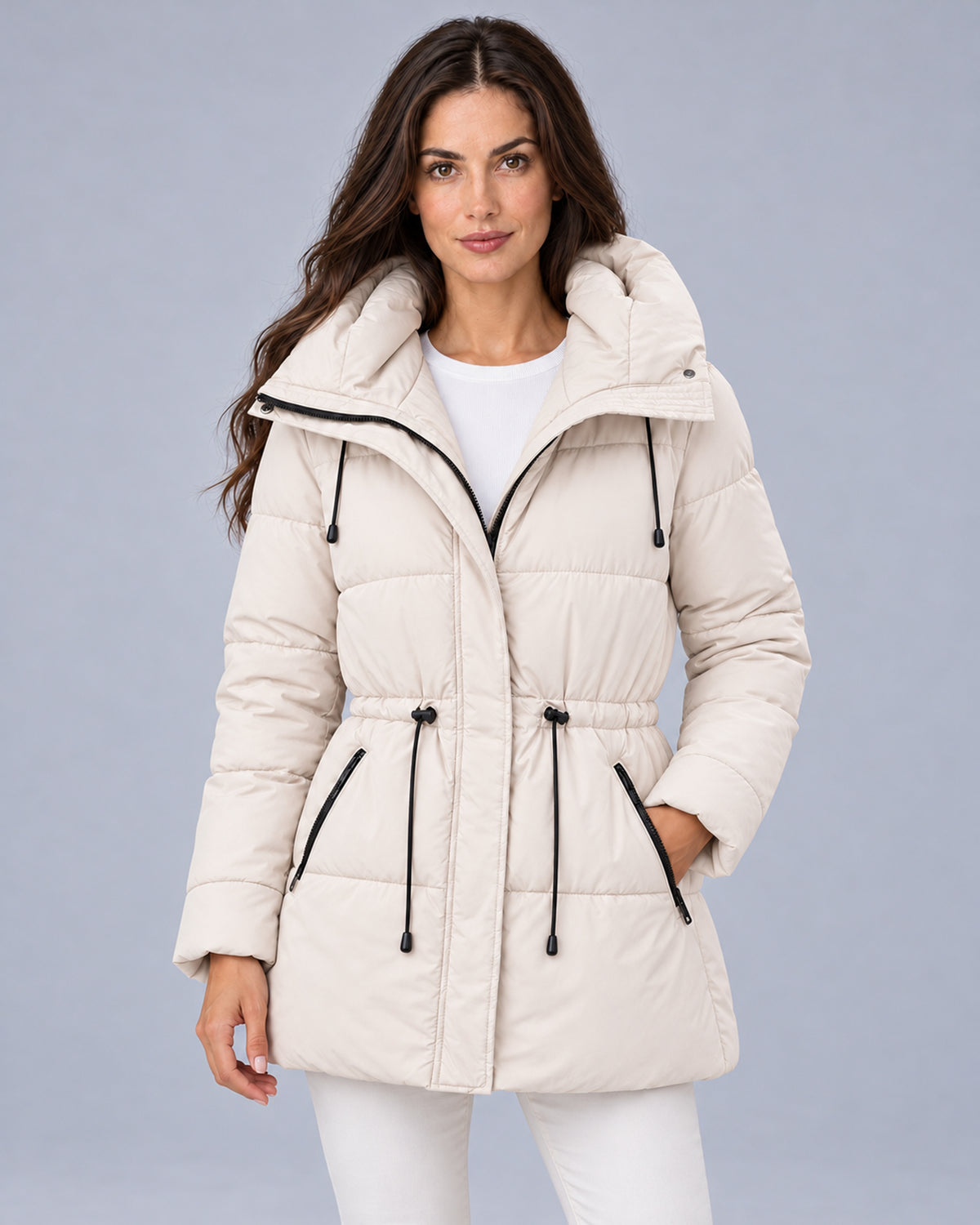 Women’s beige padded hooded parka, front view on model.