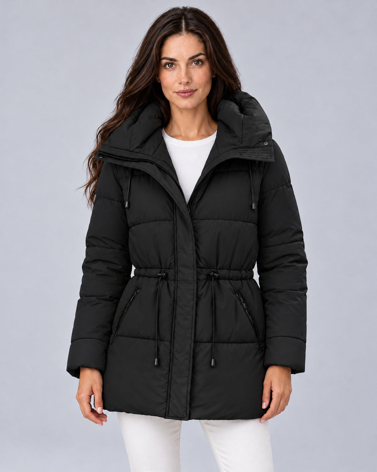 Women’s black padded hooded parka, front view on model.
