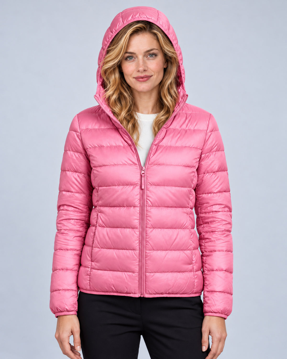 Pink women's hooded quilted puffer jacket, front view with hood up