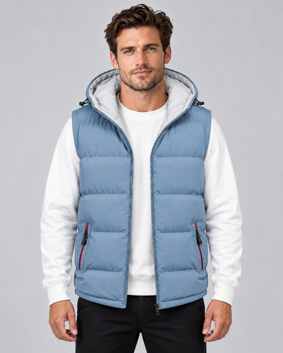 Men's haze blue hooded padded gilet with horizontal quilting, front view on a model.