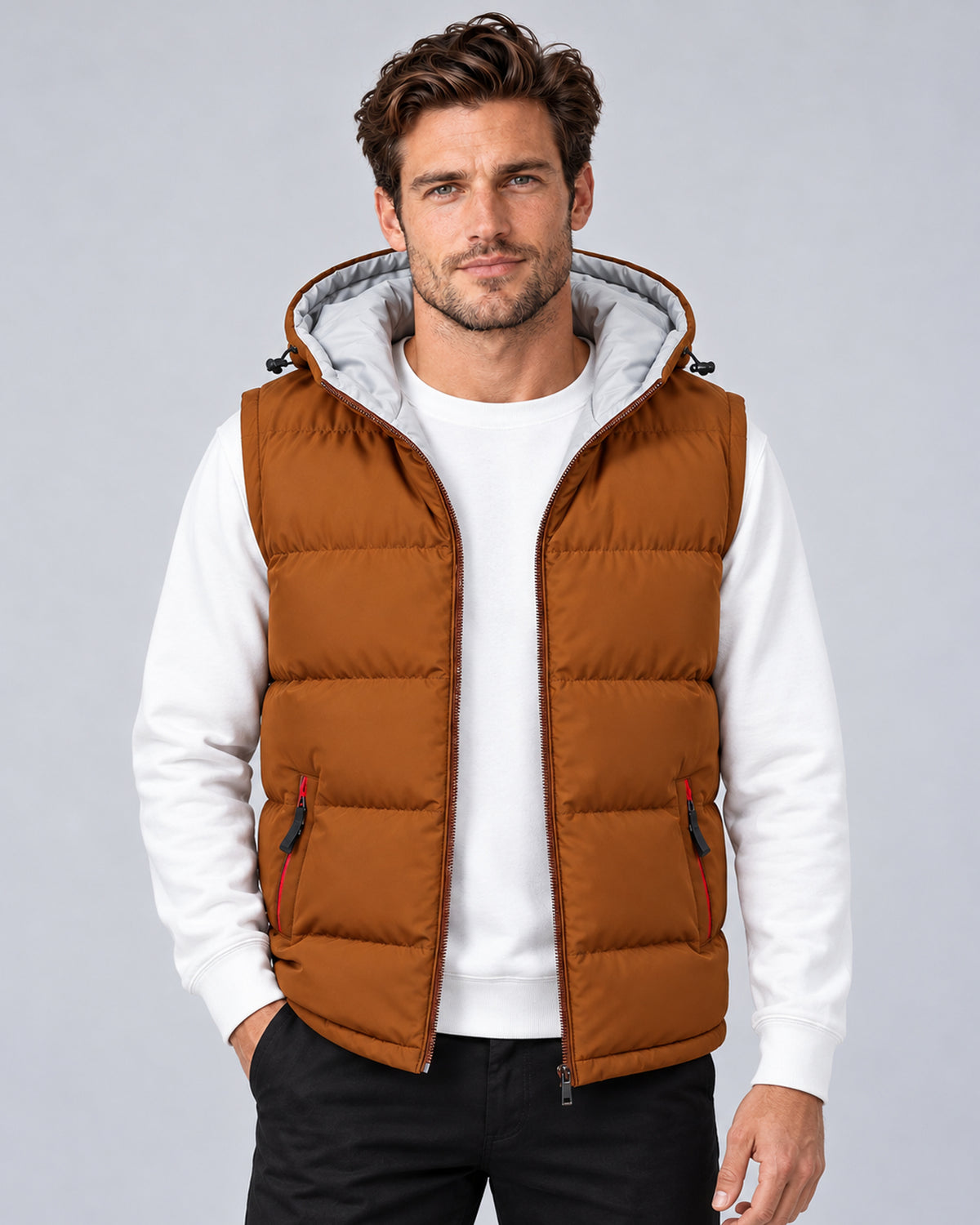 Men's coffee hooded padded gilet with horizontal quilting, front view on a model.