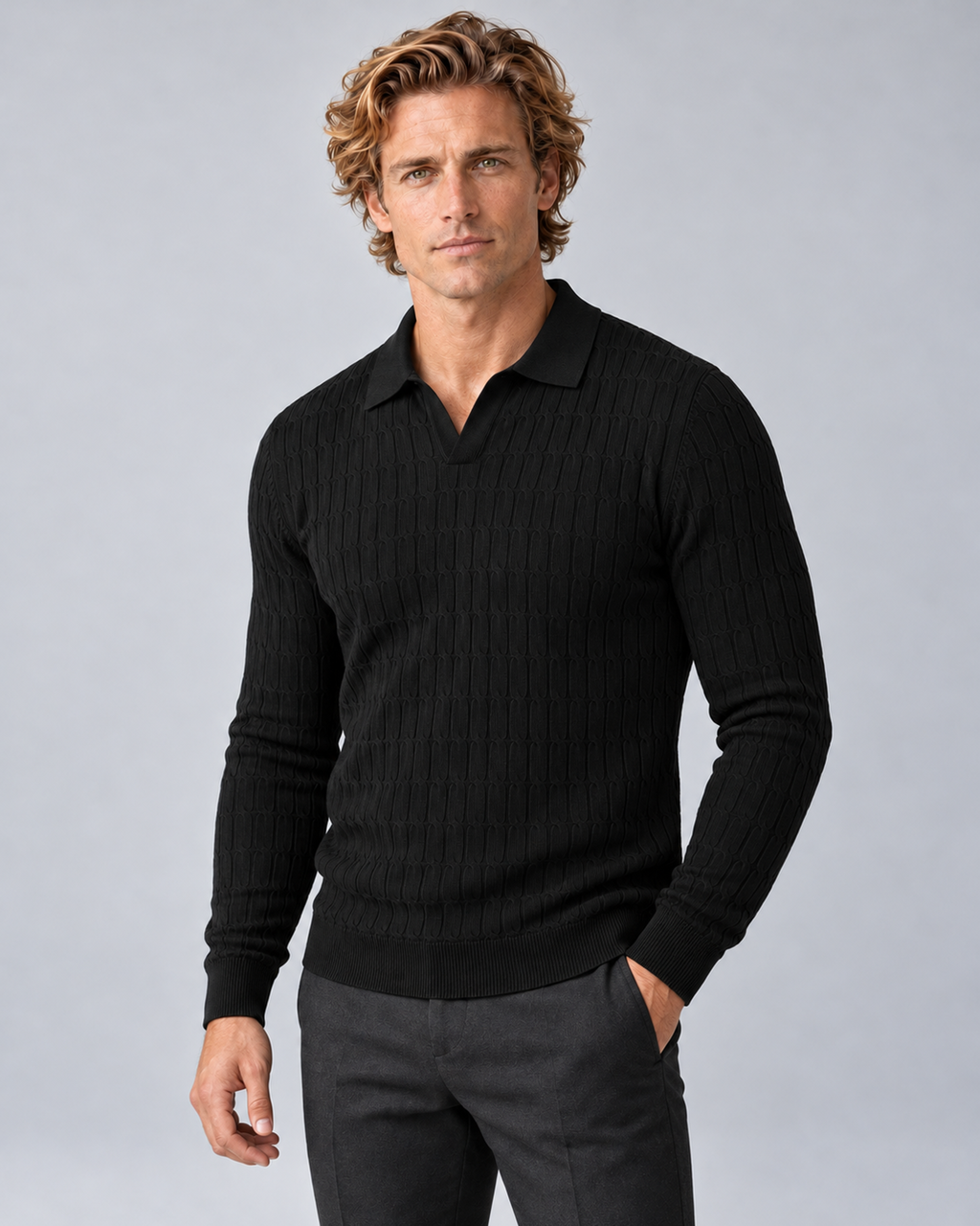 Three-quarter view of the black polo sweater showing its linked-loop knit texture and long sleeves.