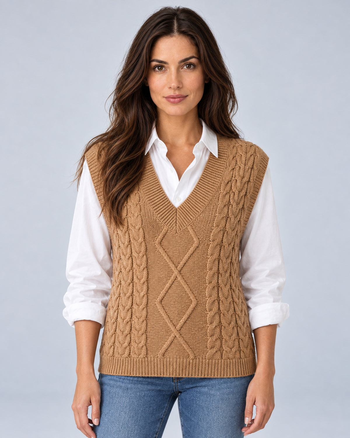 Women's khaki cable-knit V-neck sweater vest, front view over a white shirt