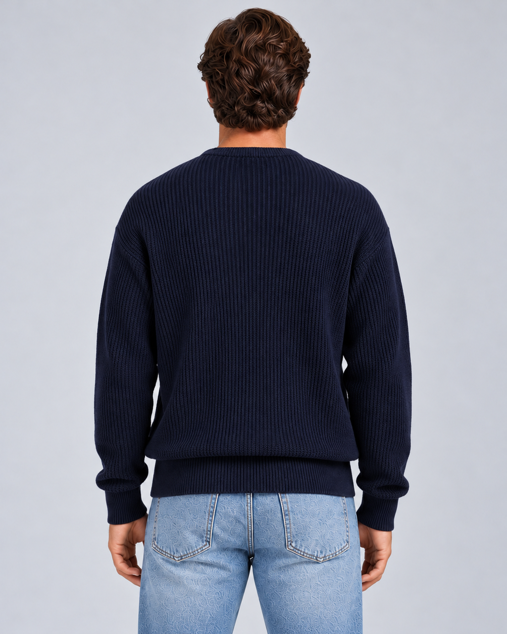 Men's round-neck zip-up rib-knit cardigan in navy, rear, on approved studio model