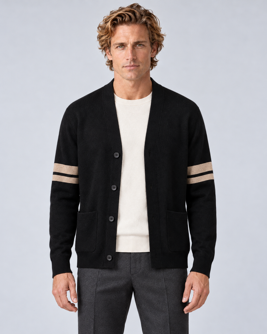 Men's V-neck button-front knit cardigan in black with contrast sleeve stripes, front hero, on a studio model