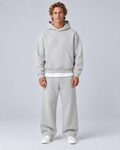 Men's pullover hoodie and straight-leg tracksuit set in light grey, front hero, on approved studio model
