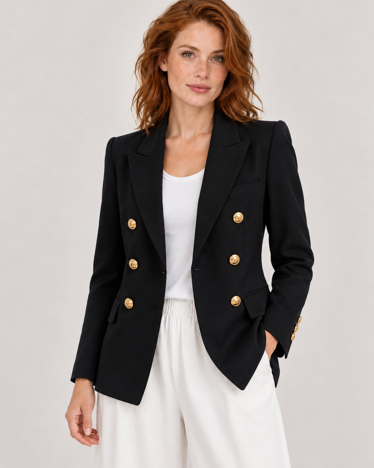 Women's tailored double-breasted blazer with gold-tone buttons in Black, front view