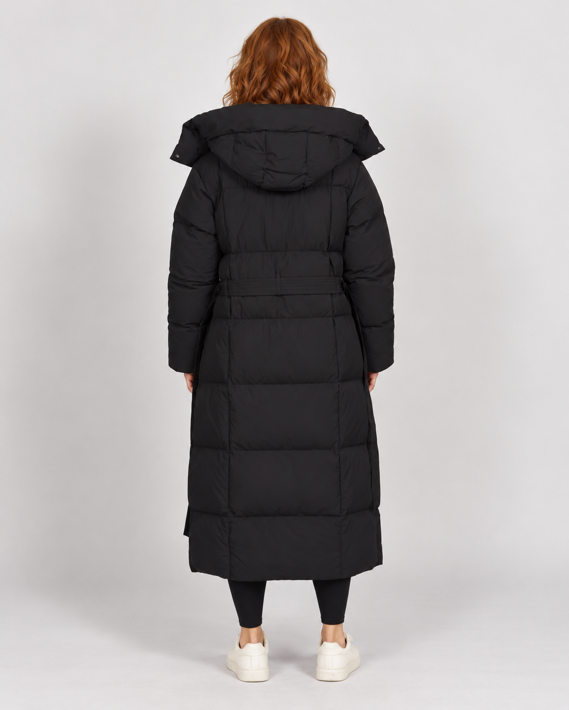 Avery & Mercer own model W03 wearing women's long belted puffer coat, black rear