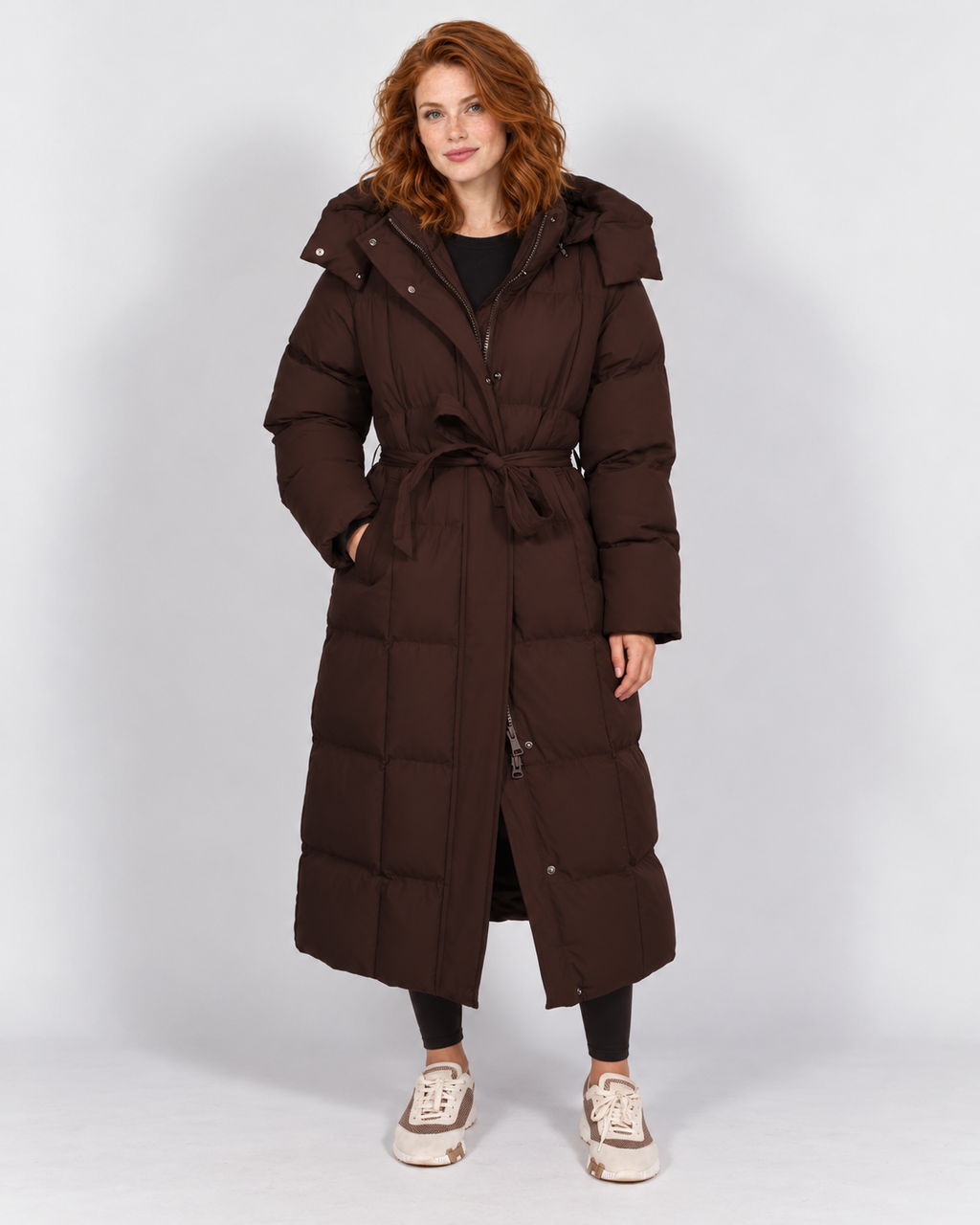Avery & Mercer own model W03 wearing women's long belted puffer coat, brown front
