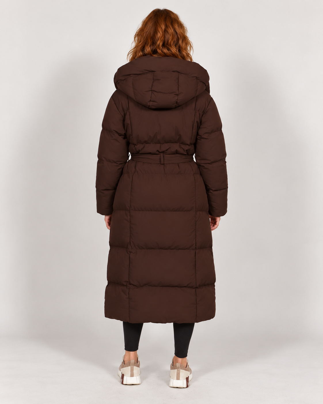 Avery & Mercer own model W03 wearing women's long belted puffer coat, brown rear